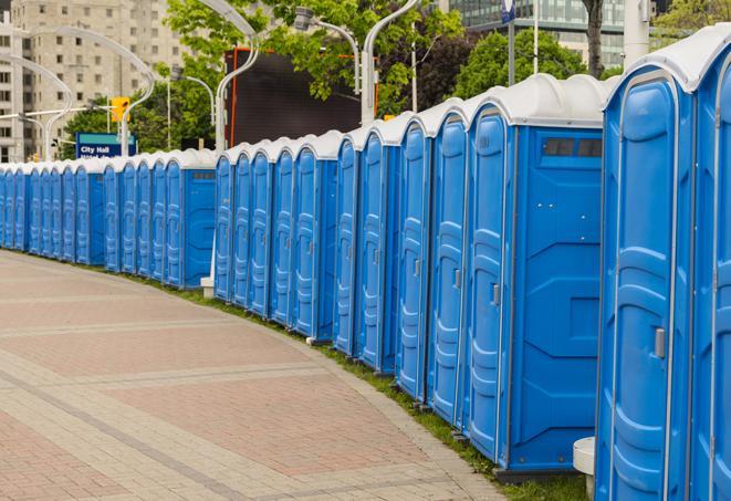 a row of portable restrooms at a fairground, offering visitors a clean and hassle-free experience in Arnold